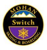 Mohan Switch Personal Achievement Award Pin.  From fall line in switch (backward) stance, link four medium radius turns and return to normal stance.