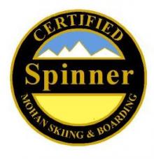 Certified Spinner Personal Achievement Award Pin.  From fall line, makes two fluid 360 spins and exites down fall-line maintaining consistent forward speed.